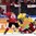 HELSINKI, FINLAND - DECEMBER 26: Sweden's Axel Holmstrom #25 collides with Switzerland's Roger Karrer #4 during preliminary round action at the 2016 IIHF World Junior Championship. (Photo by Matt Zambonin/HHOF-IIHF Images)